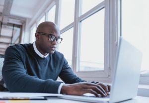 Man searching on his laptop